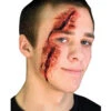 Zerschnittenes Auge Wunde / Slashed Eye 1 Zerschnittenes Auge Wunde / Slashed Eye -Halloween Kostüme slashed eye latexwunde zerschnittenes auge halloween wunde latex applikation sfx halloween wunde 12513